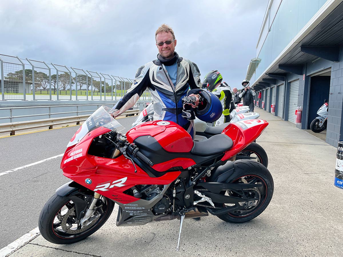 Jom at the racetrack on a BMW S1000RR